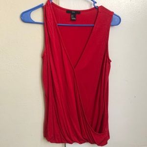 Red sleeveless shirt